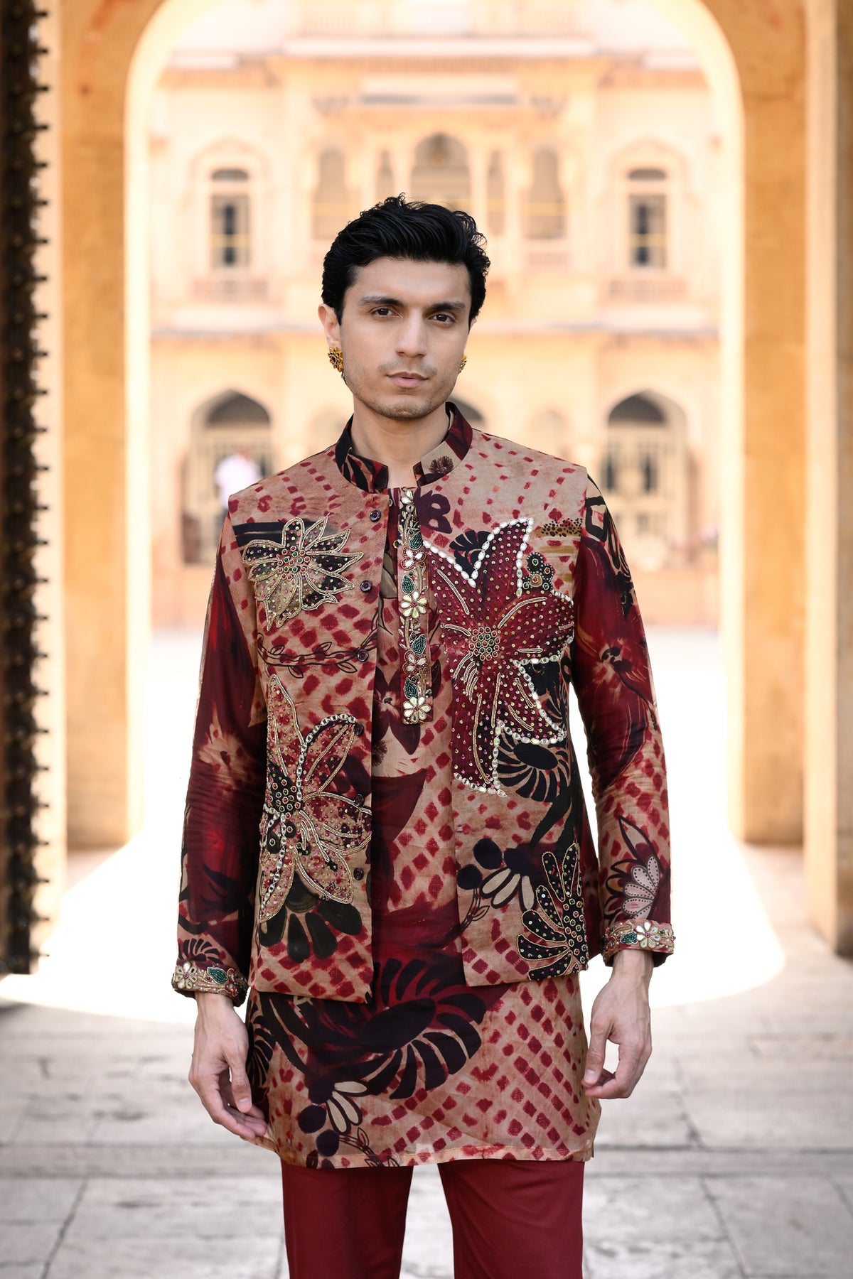 Maroon Highlighted Bundi With Organza Printed Kurta and Maroon Flare Pant