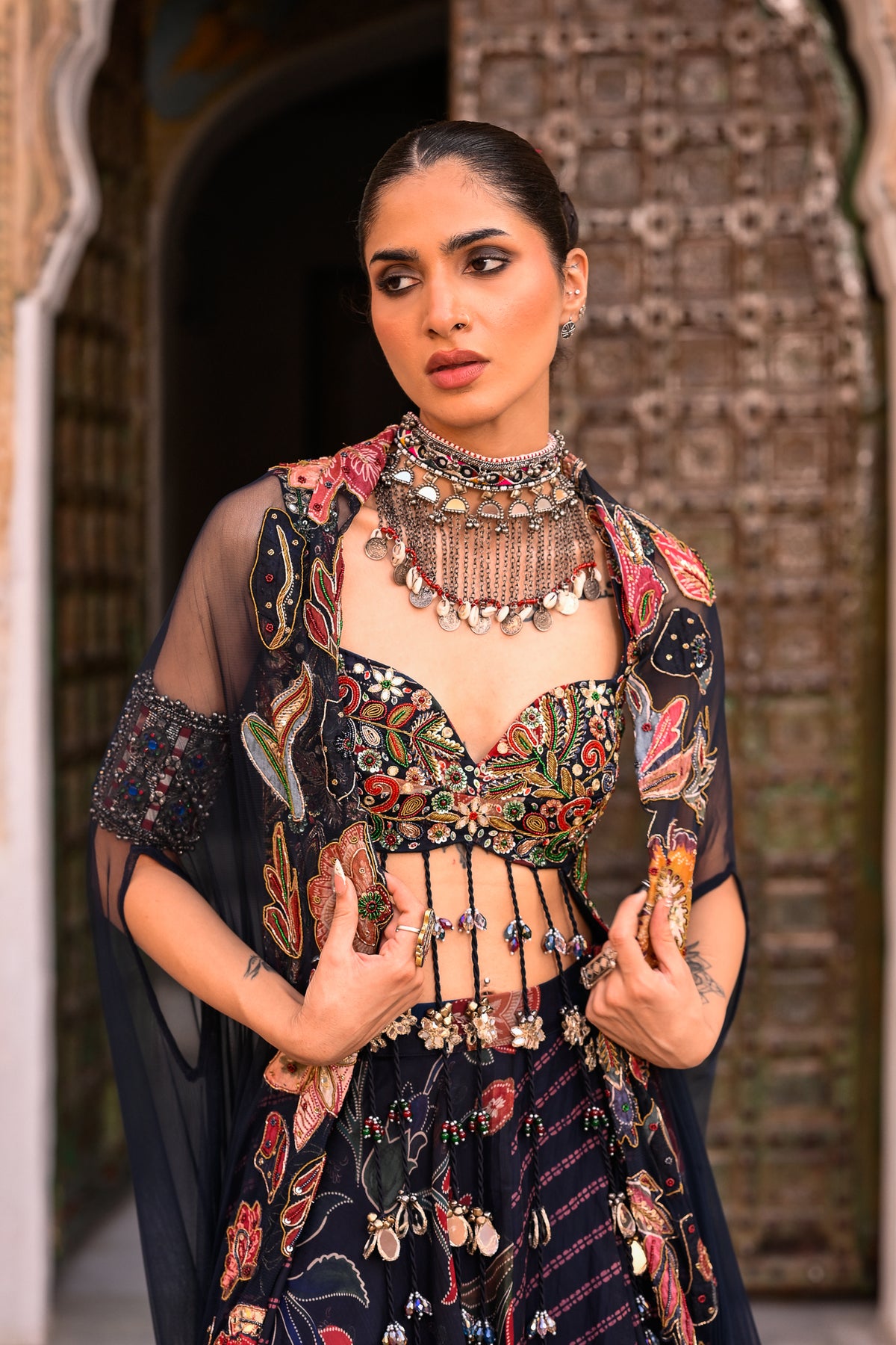 Dual Printed Lehenga With Embroidered Tassle Blouse With Applique Cape