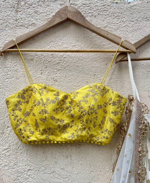 Ivory Ruffle Lehenga and Yellow Bustier Set image 3