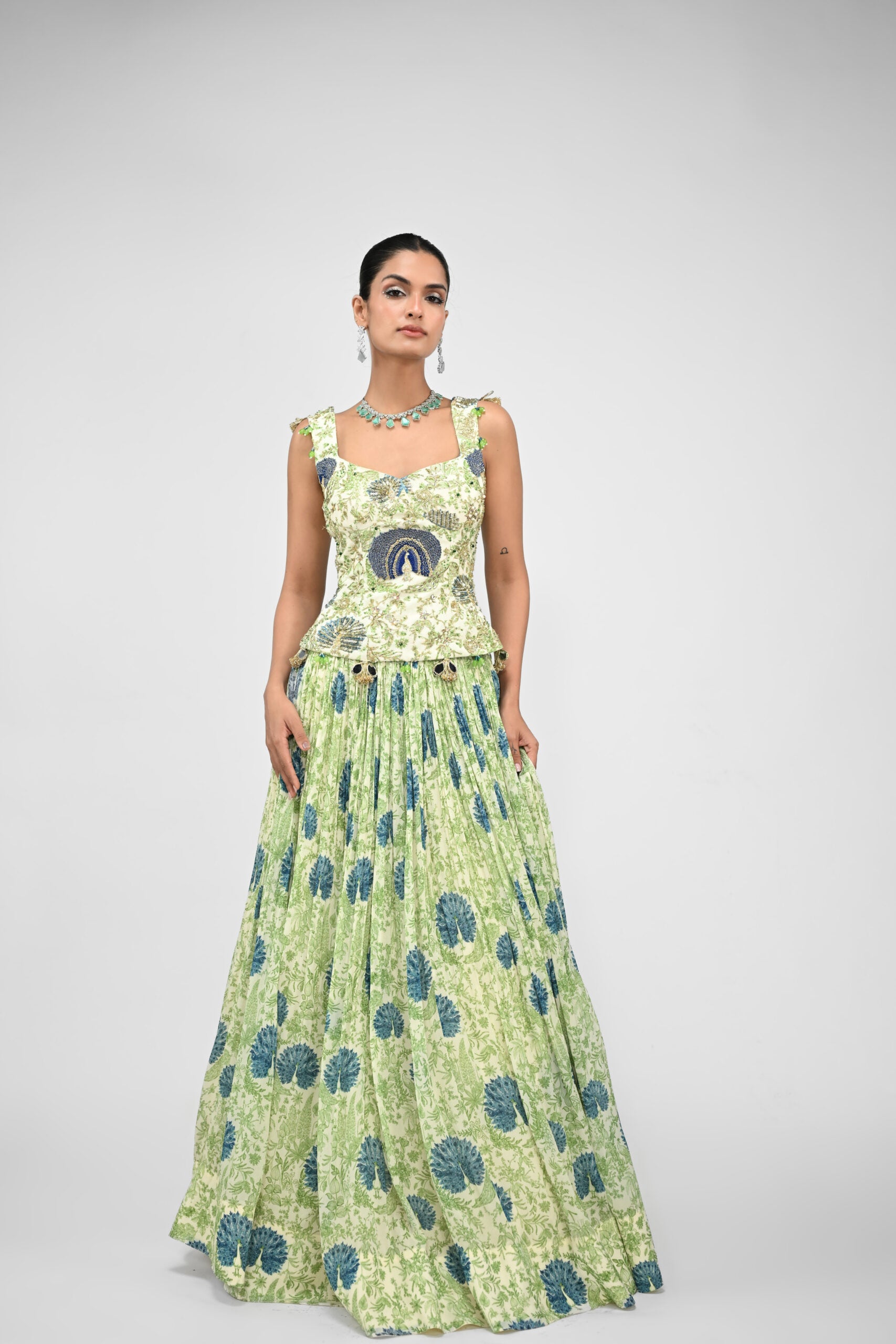 Peacock Highlighted Lehenga Paired With Highlighted Peacock Corset image 1