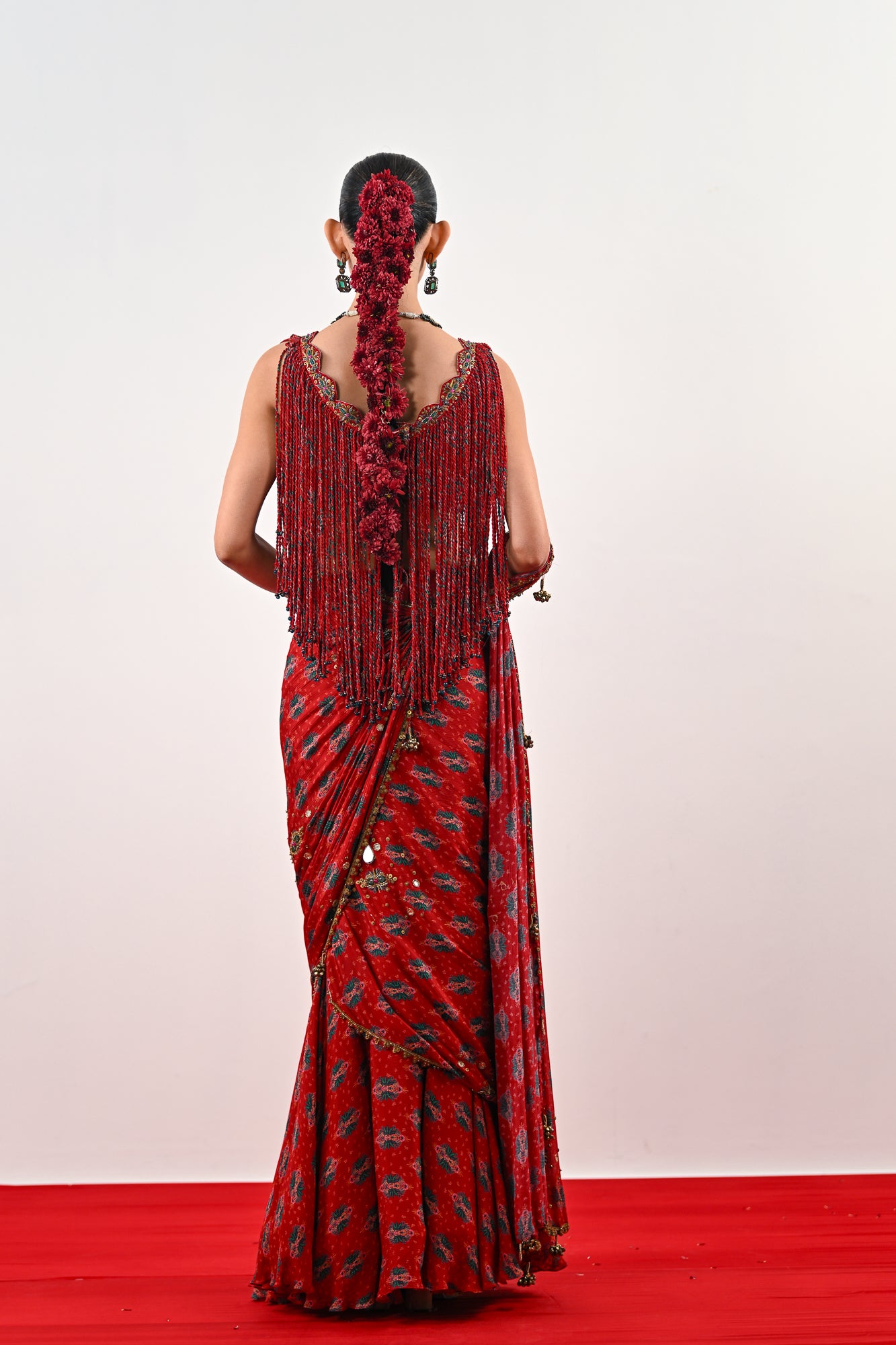 IS PRE STITCHED SAREE PAIRED WITH TASSLE BLOUSE image 1