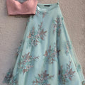 Pink Off-Shoulder Blouse With Sage Green Lehenga image 0