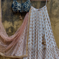 Ivory Ruffle Lehenga and Green Blouse Set image 0