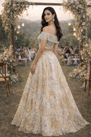 Silver Sequins Shoulder Blouse with Tassles teamed with an Ivory Organza Jaquard Skirt in Metallic Florals image 3