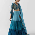 Blue Three Layered Lehenga Paired With Blouse And Dupatta image 0