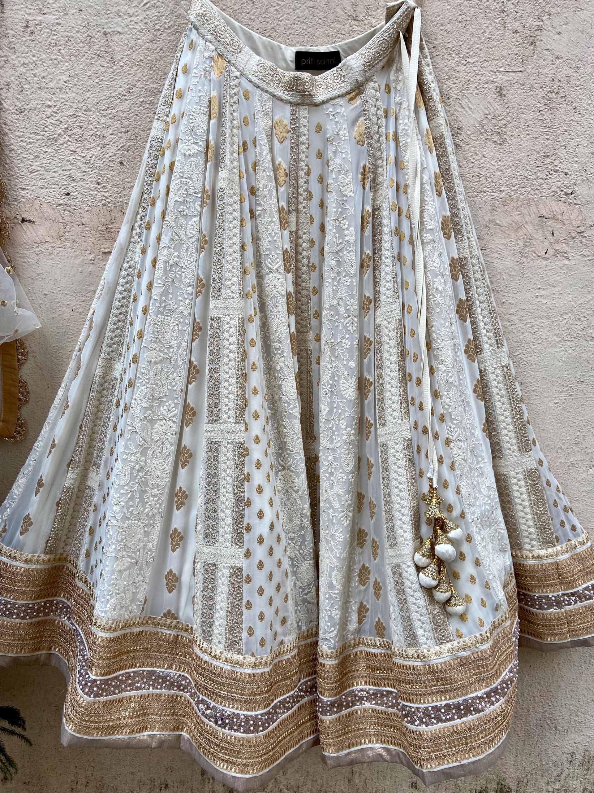 Ivory Multipanel Embroidered Lehenga Set With Mirror Blouse image 2