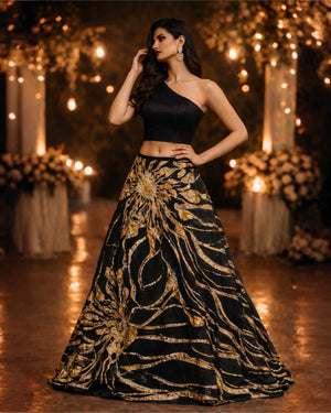 Black one Shoulder Blouse teamed with  a Black and Molten Gold Woven Skirt image 2