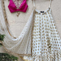 Ivory Ruffle Lehenga and Fuchsia Blouse Set image 0