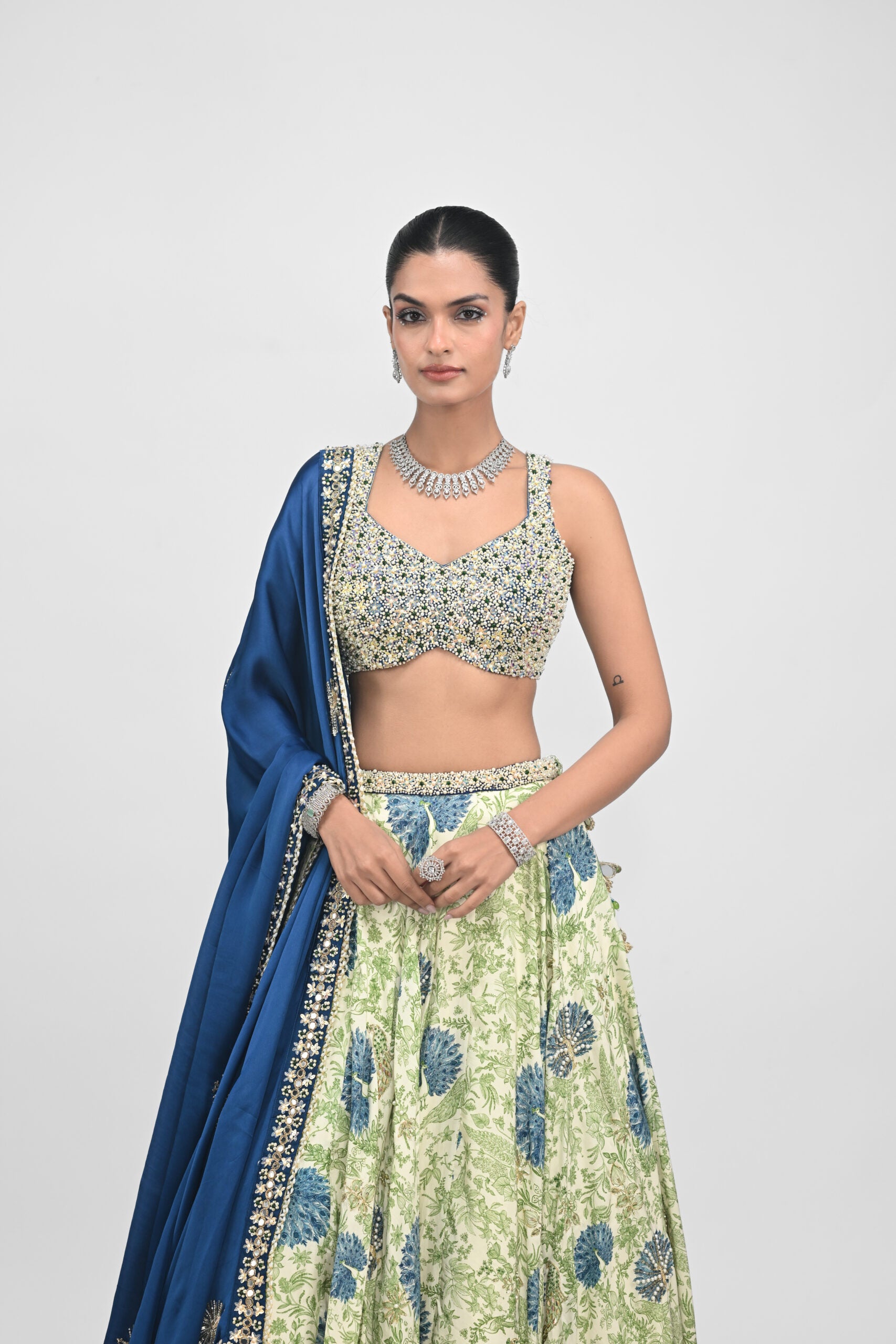 Peacock Highlighted Lehenga Paired with Pearl Blouse and Embroidered Dupatta image 6