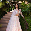 Off-White Net Embroidered Lehenga Set image 0