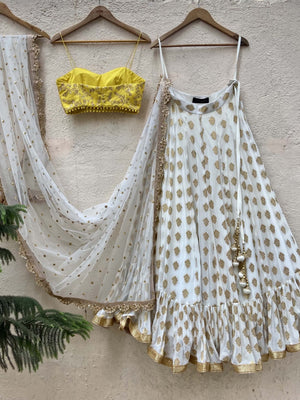 Ivory Ruffle Lehenga and Yellow Bustier Set image 2