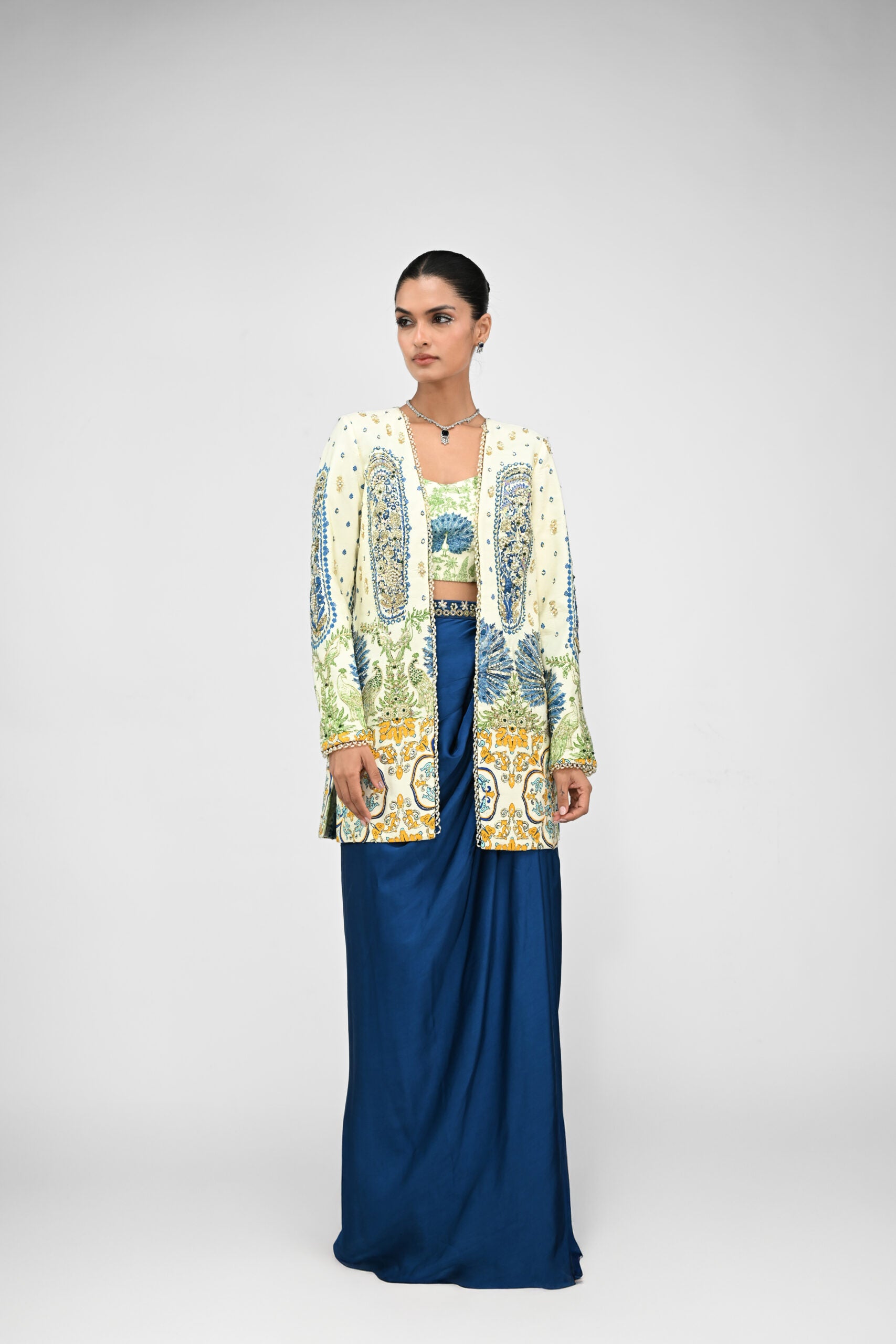 Royal Highlighted Blazer Paired With Peacock Bralette and Blue Cowl Skirt - L image