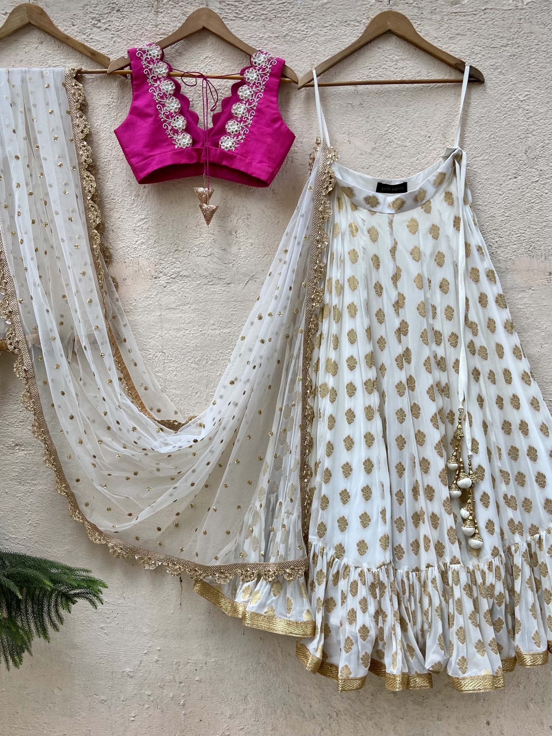 Ivory Ruffle Lehenga and Fuchsia Blouse Set image 2