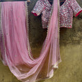 Blush Net Saree with Red Mirror Blouse image 0
