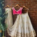 Ivory and Fuchsia Lehenga Set with Mirror Work image 0