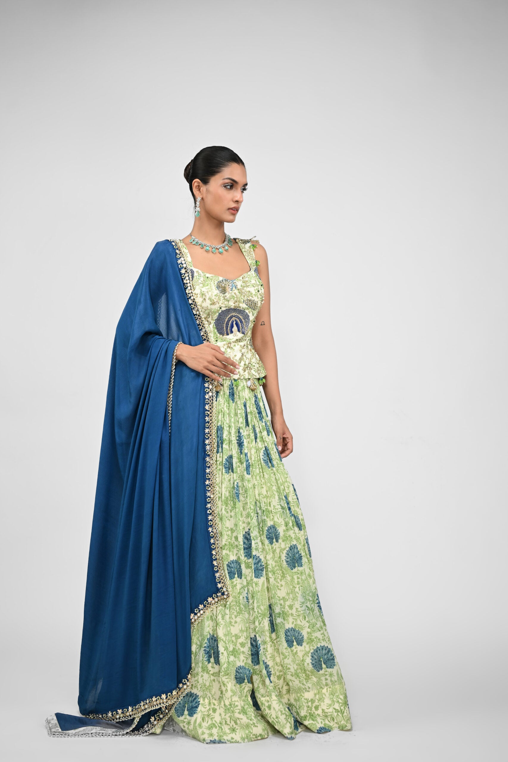 Peacock Highlighted Lehenga Paired with Highlighted Peacock Corset and Embroidered Dupatta - S image