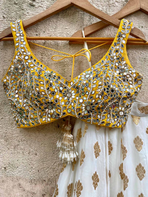 Ivory Gold Ruffle Lehenga Set With Yellow Mirror Blouse image 1