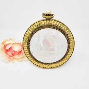Round Gold and Mother of Pearl Clutch image 0