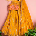 Fire Yellow Lehenga Set With Floral Blouse image 0