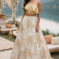 Glam gold one shoulder ruffle blouse with an ivory organza skirt image 0