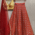 Yellow Blouse with Orange Mirror Work Lehenga image 0