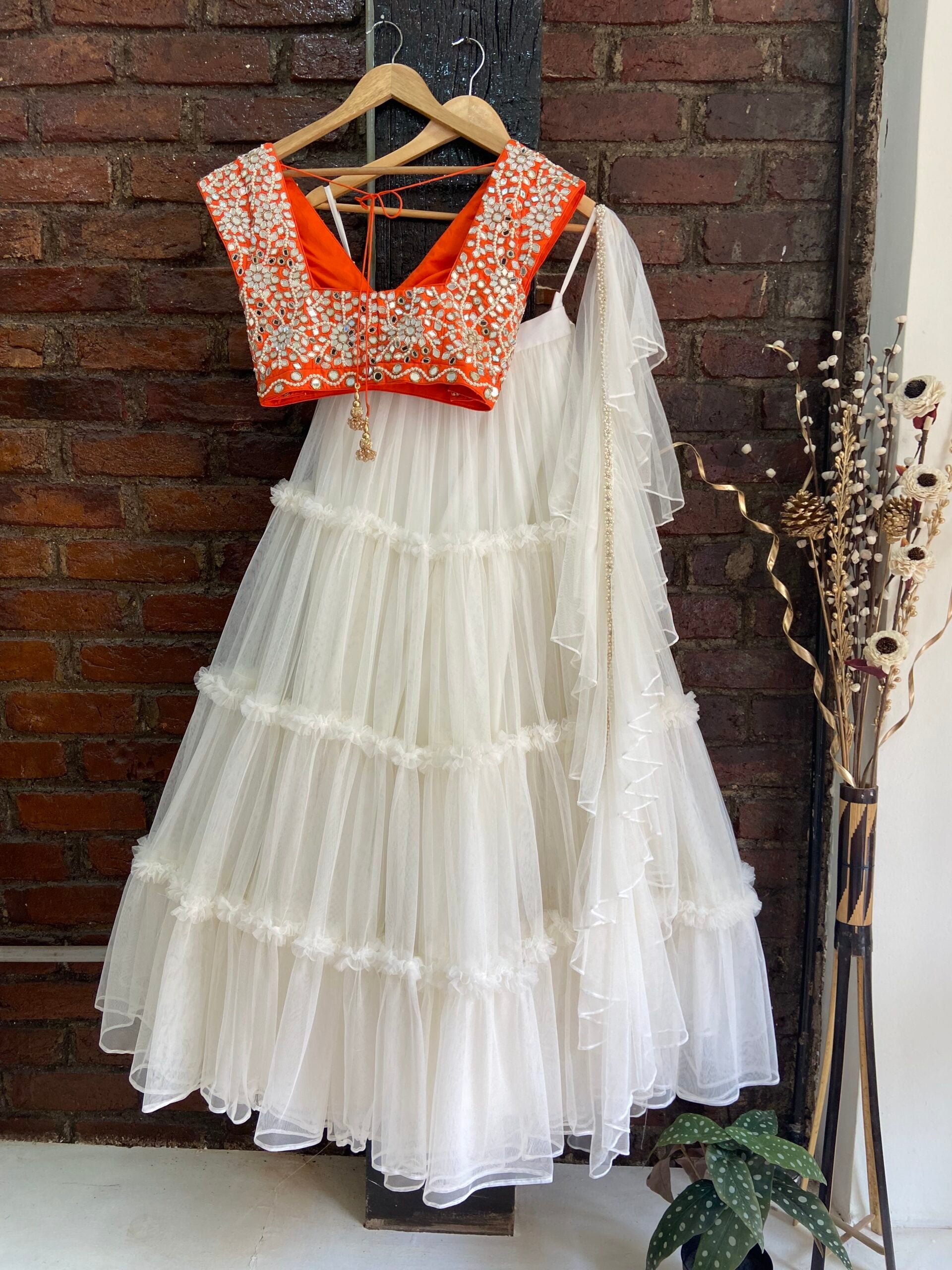 Ivory and Orange Tier Lehenga Set image 1