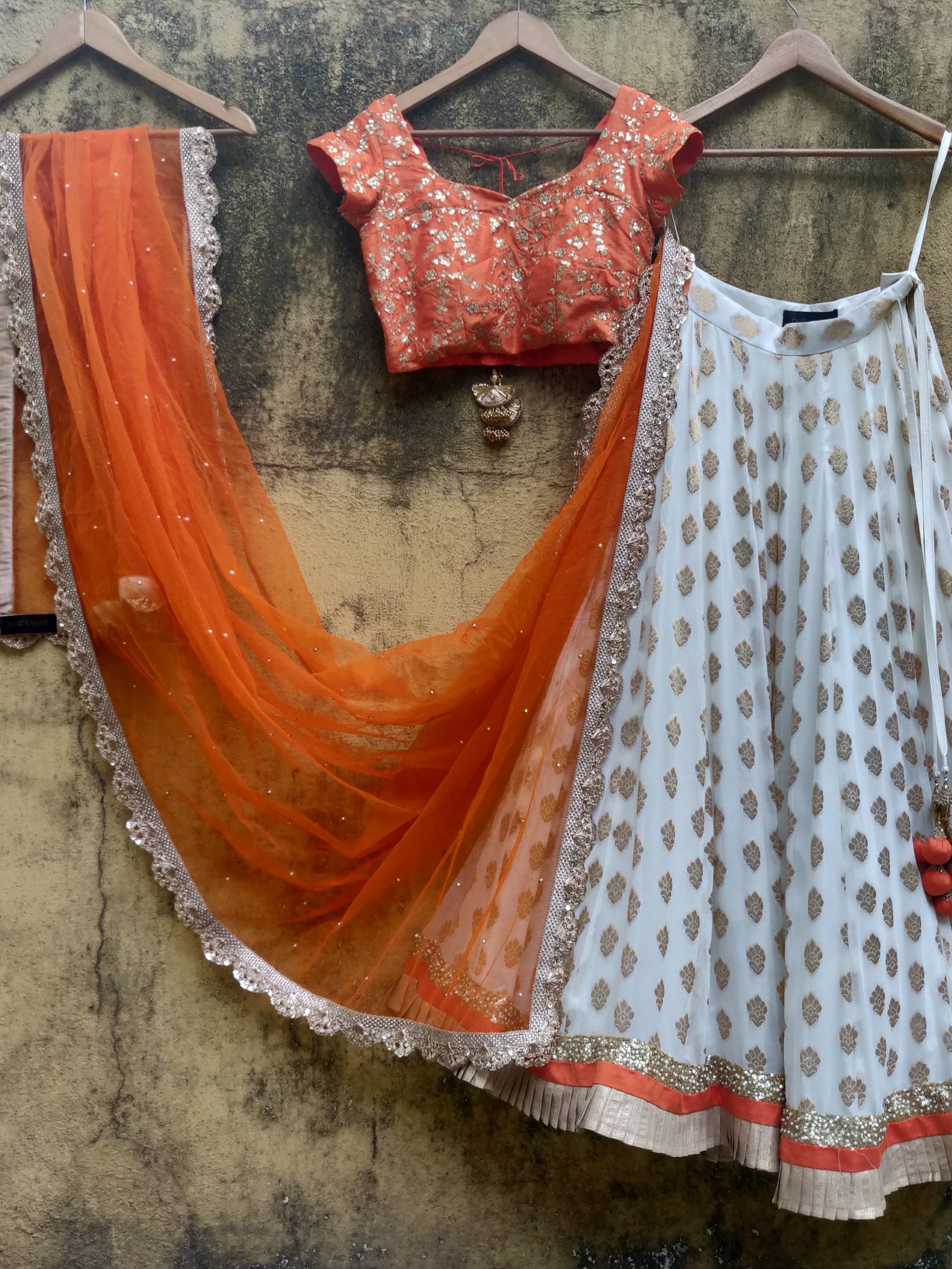 Orange and Ivory Ruffle Lehenga image 0