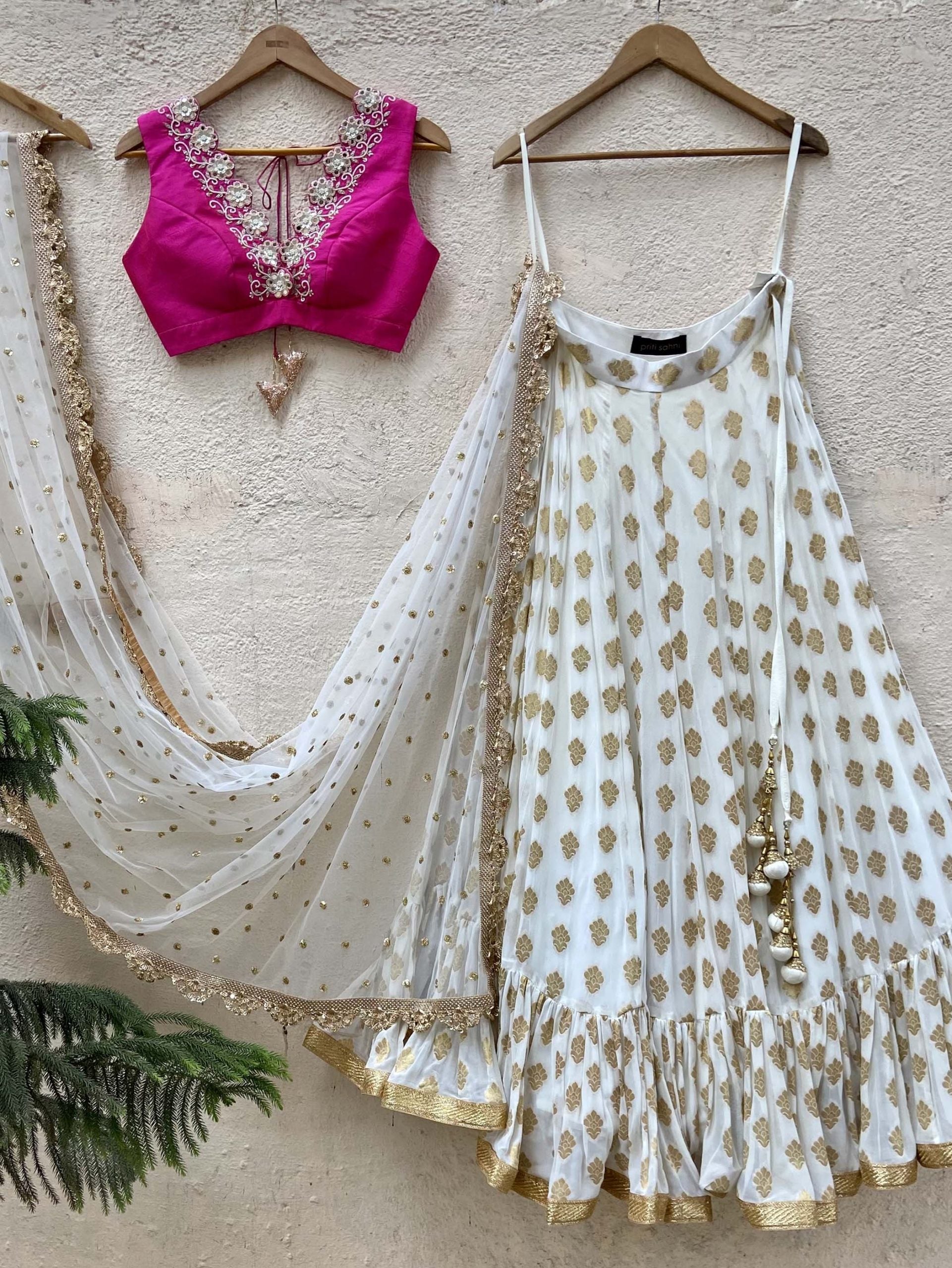 Ivory Ruffle Lehenga and Fuchsia Blouse Set - M image