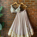 Mauve Brocade Georgette Lehenga with Mirror Work Blouse image 0
