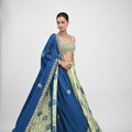 Peacock Highlighted Lehenga Paired with Pearl Blouse and Embroidered Dupatta image 0