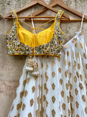 Ivory Gold Ruffle Lehenga Set With Yellow Mirror Blouse image 3