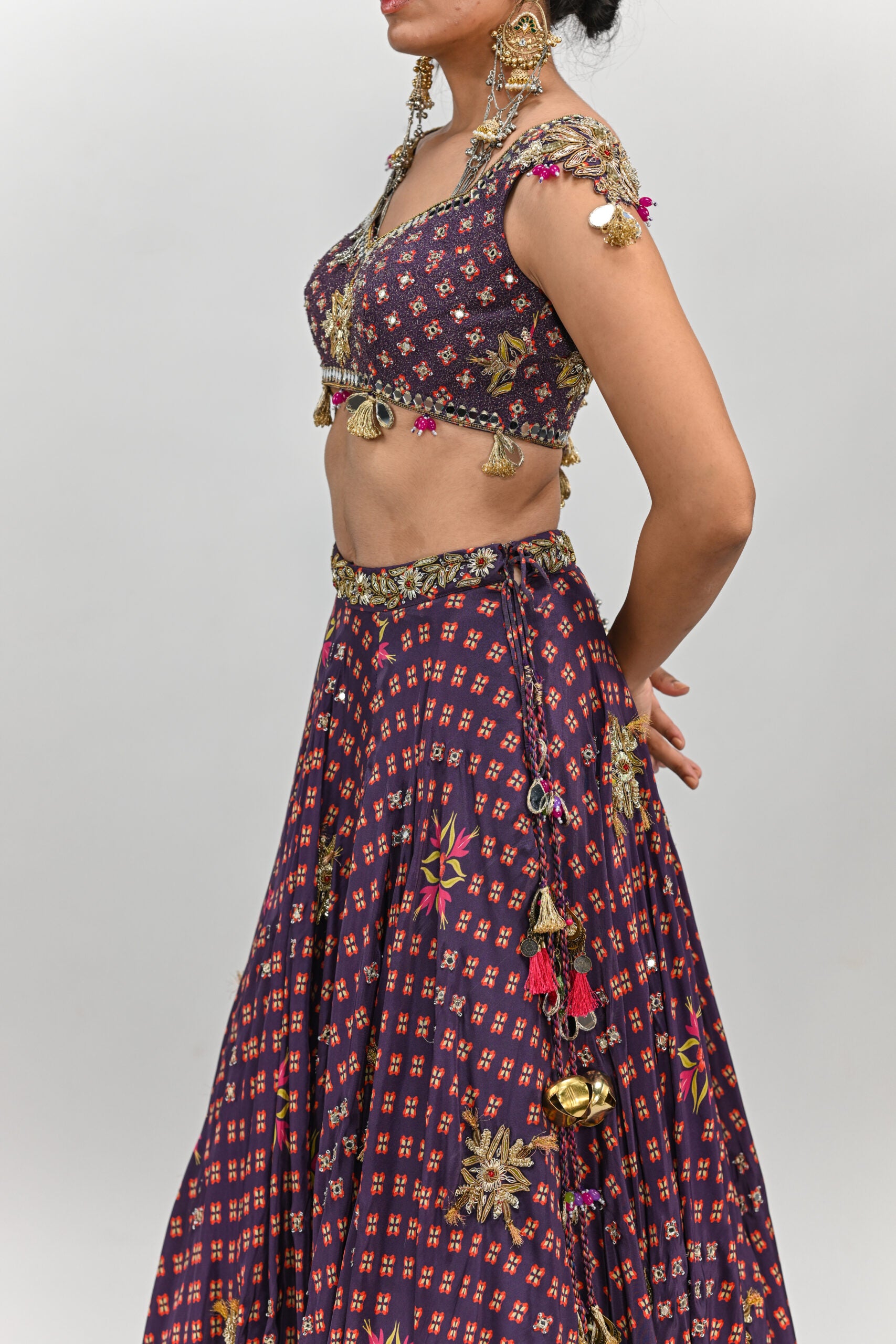 Plum Pre Stitched Tassel Saree Paired with Badla Highlighted Blouse image 8