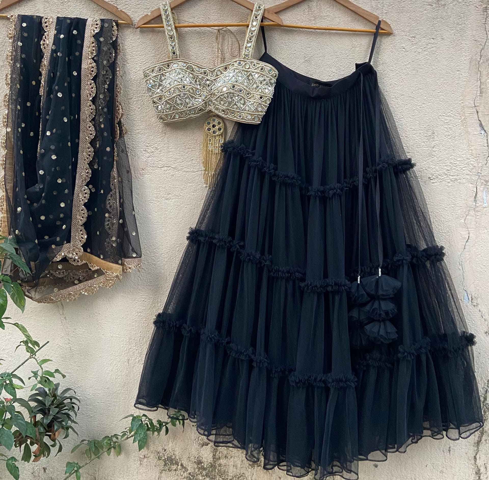 Black Tier Ruffle Lehenga With Bustier - Custom image