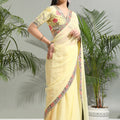 Yellow Saree with Floral Blouse image 0